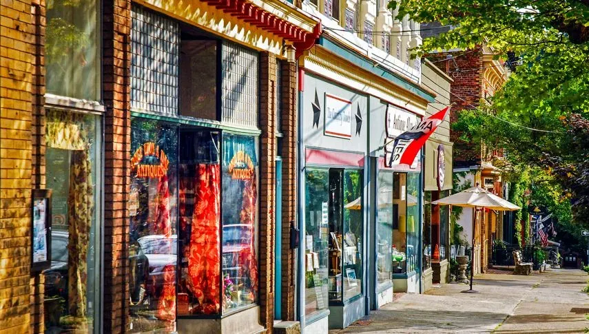 Boutiques, antique shops and local shops on a street in Cold Spring New York City, where PS&D is hiring physicians.