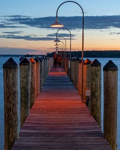 Representing Delaware is a view of Dewey Beach at sunset.