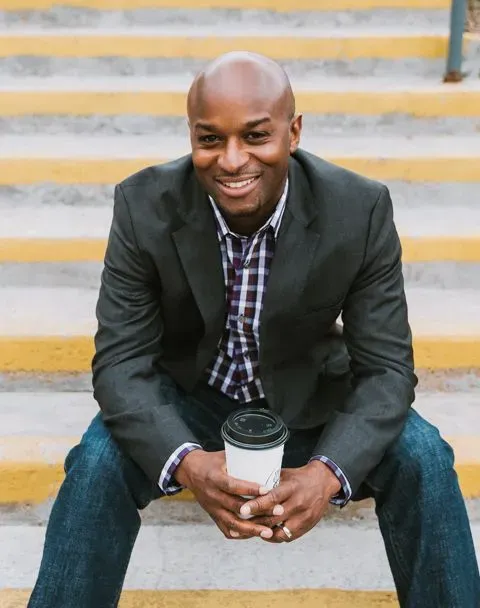 Man smiling with coffee