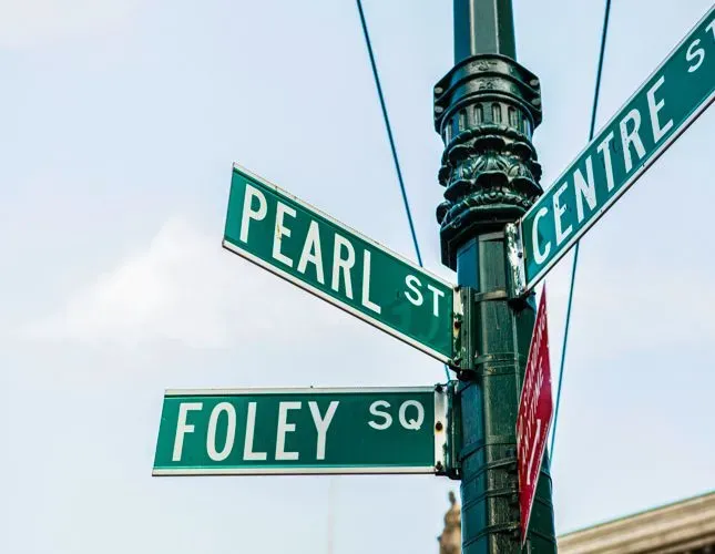 Manhattan street sign; Centre Street, Pearl Street, Foley Square.