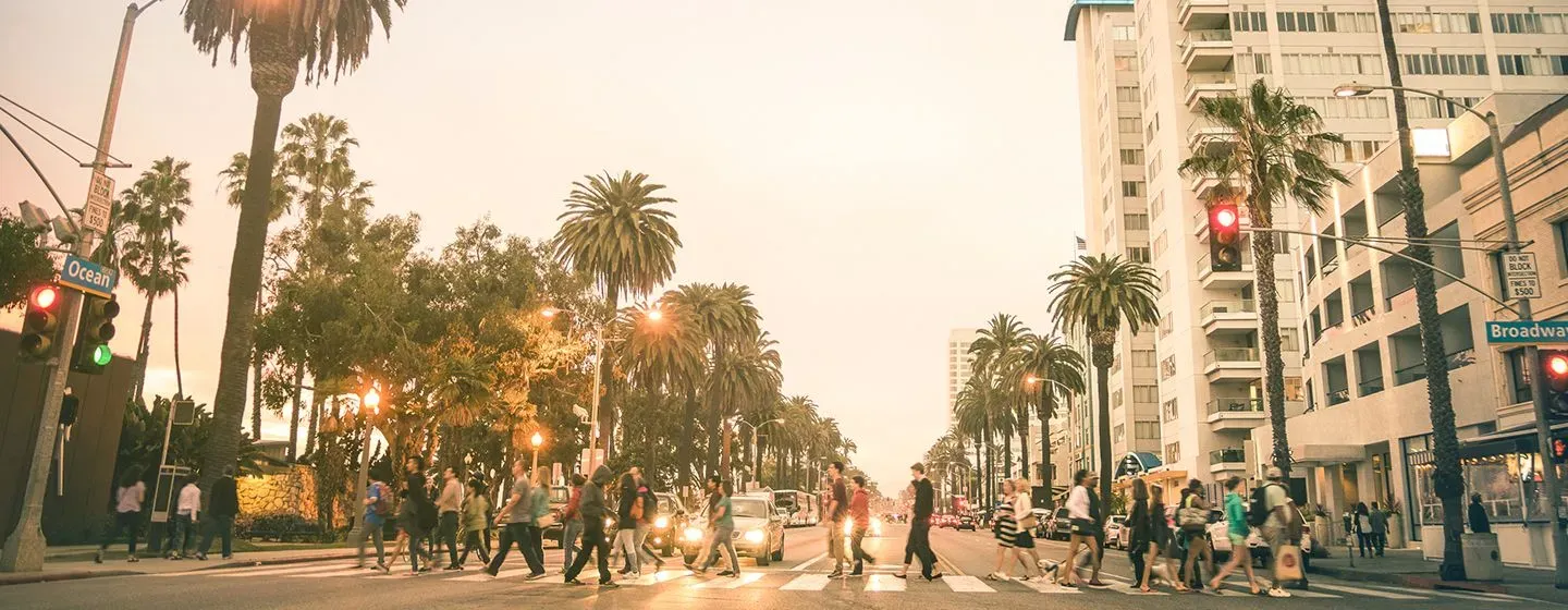 A busy crosswalk in downtown Santa Monica, California.