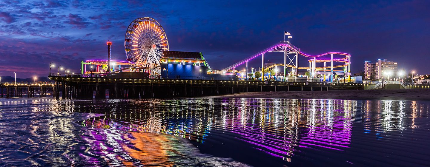 At night, the Santa Monica, California ferris wheel and pier. 
