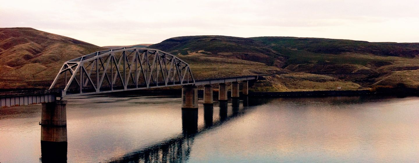 Bridge over a river with mountains on both sides in Walla Walla, Washington.