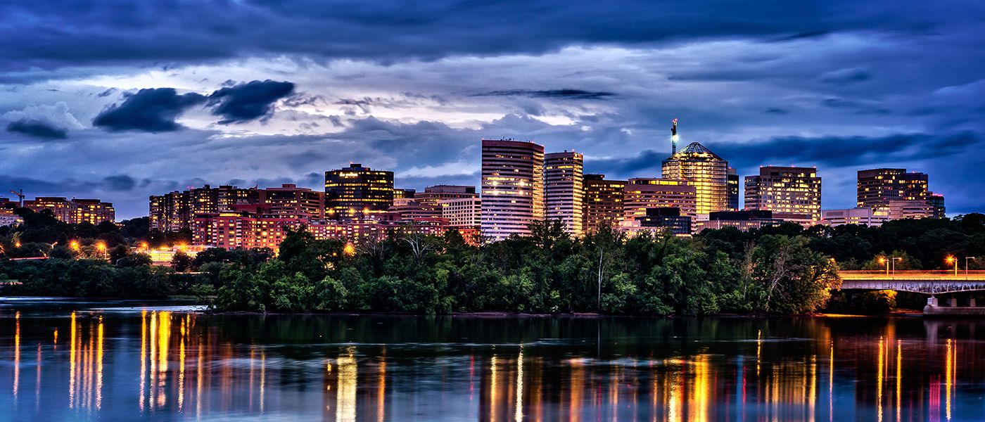 Rossyln, Arlington, Virginia, city skyline at dusk on the Potomac River; where PS&D is hiring physicians.