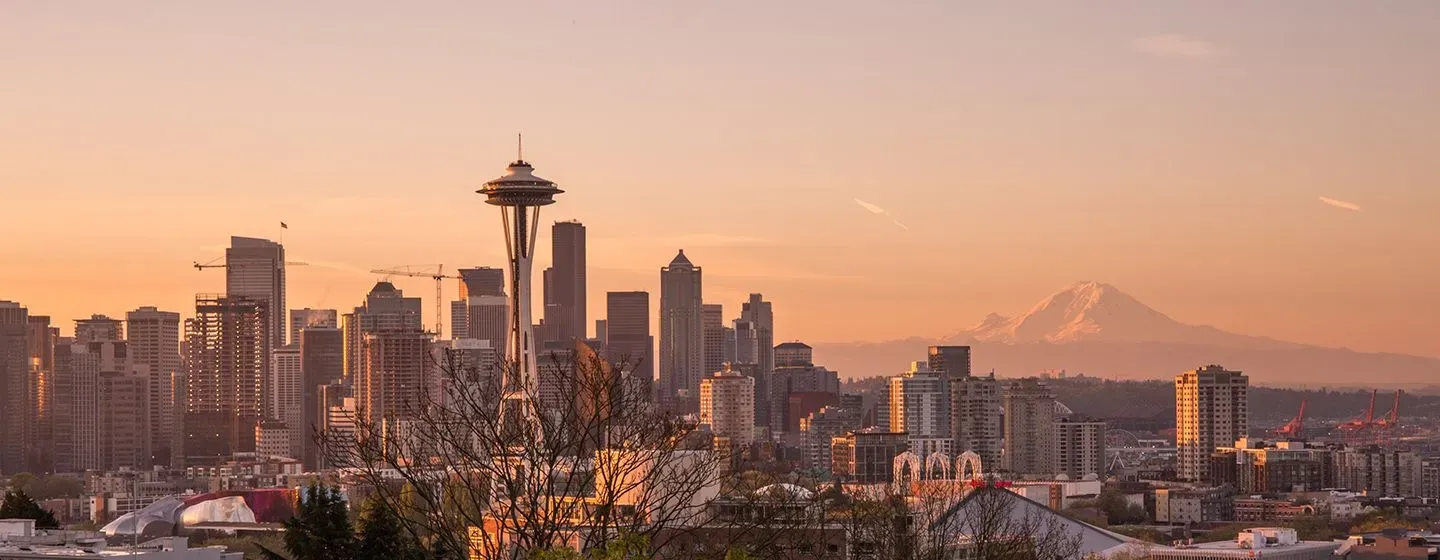 Aerial view at sunset of downtown Seattle, Washington with the Space Needle in the middle.