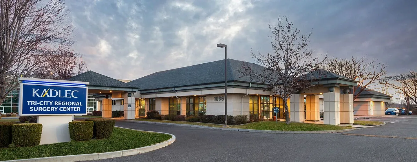 PS&D Kadlec's Tricity Regional Surgery Center at sunset with clouds in the background.